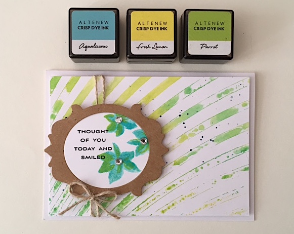 Create easy watercolor backgrounds with Altenew stencils and inks!