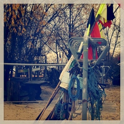 Sara Naumann fishing boat flags on the beach