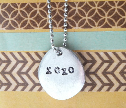 Sara Naumann metal stamped pendant